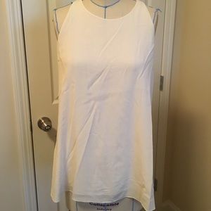 Pleated cross back swing tank